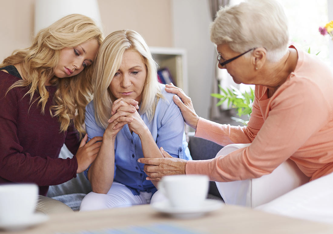 wrongful death attorney consoling family